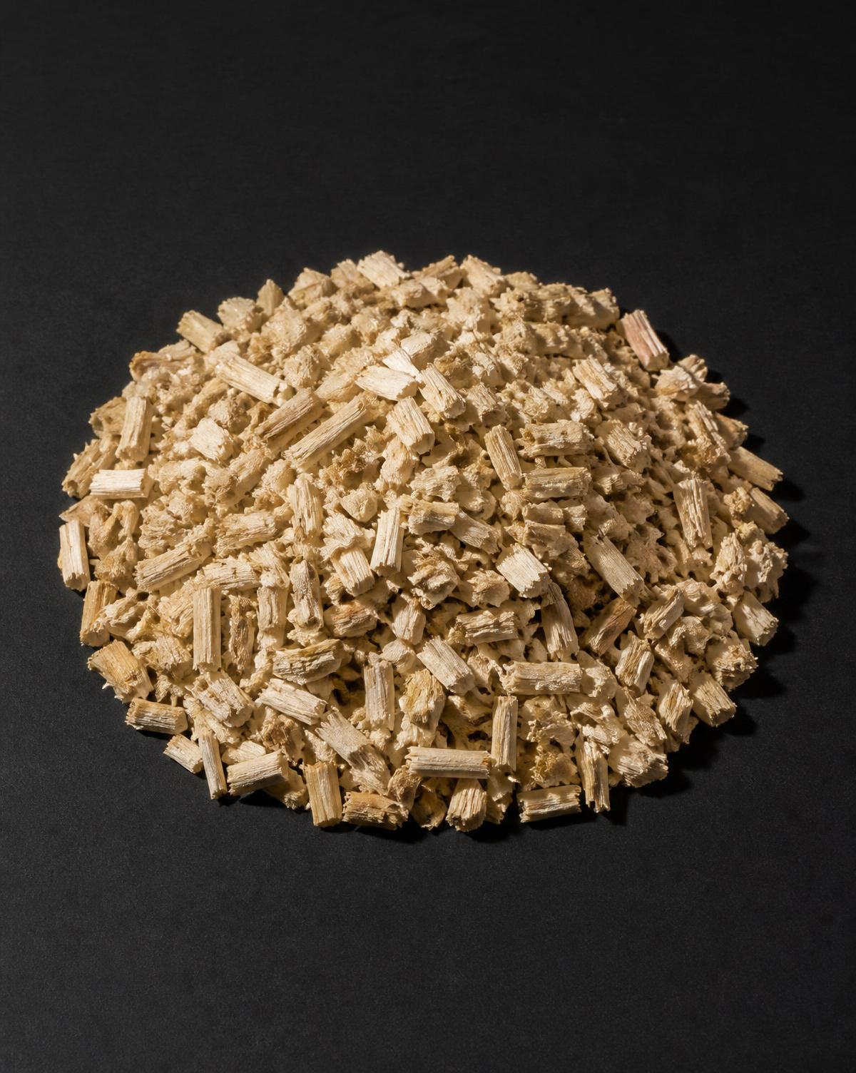 Specimen study of hemp hurd — uniform woody core material for construction and animal care.